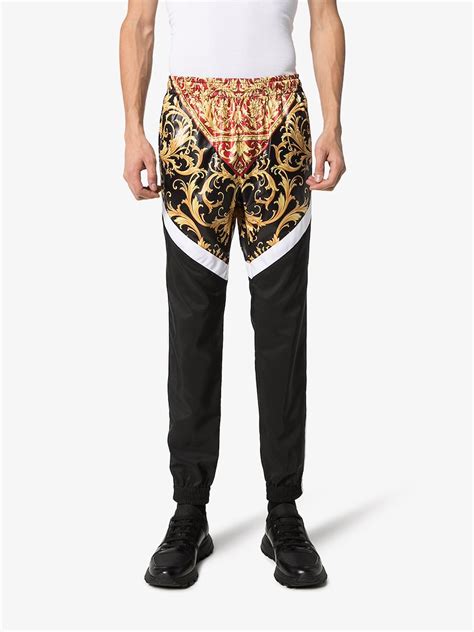 versace track pants.